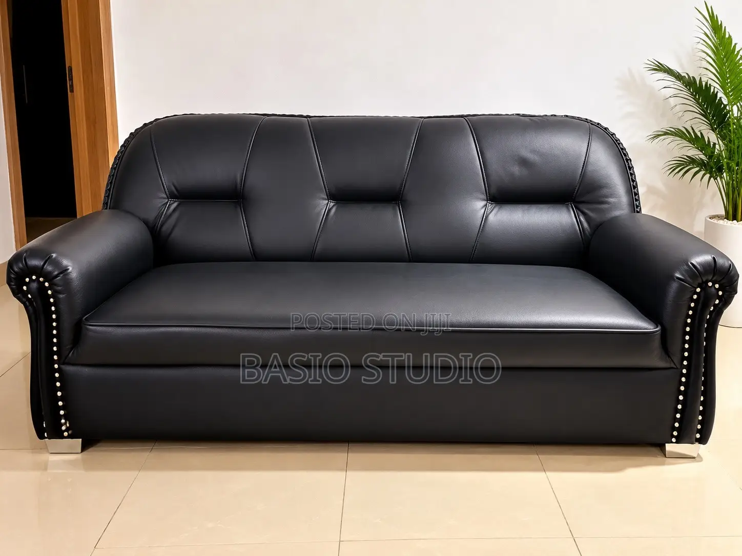 Set of 4 Black Leather Sofas (3 Single Seaters + 1 Three Seater)