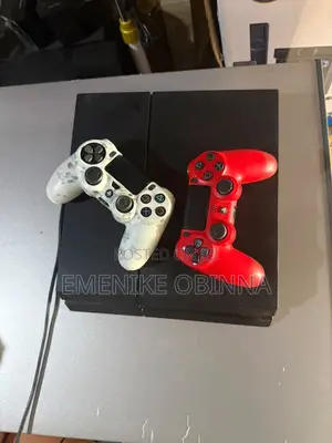 Sony PlayStation 4 500GB Slim Console Plus Extra Controller.