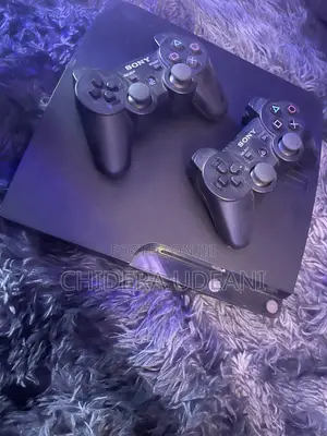 PS3 Slim With 8 Games and 2 Pads