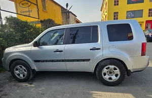 Honda Pilot Touring 4dr SUV 4WD (3.5L 6cyl 5A) 2009 Silver