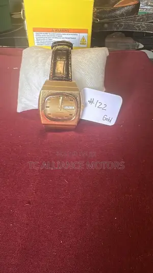 Clinton Gold Watch