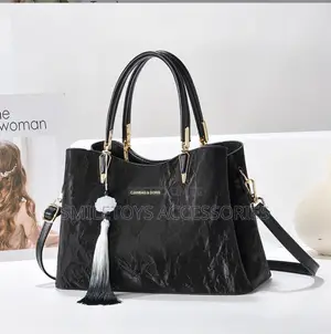 Ladies Crinkled Leather Handbag With Tassel Charm & Strap