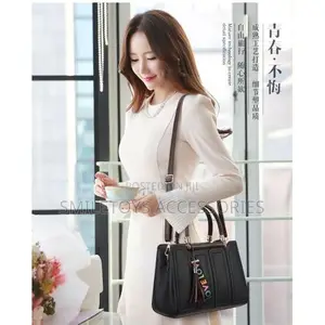 Structured Handbag With Tassel Charm & Strap
