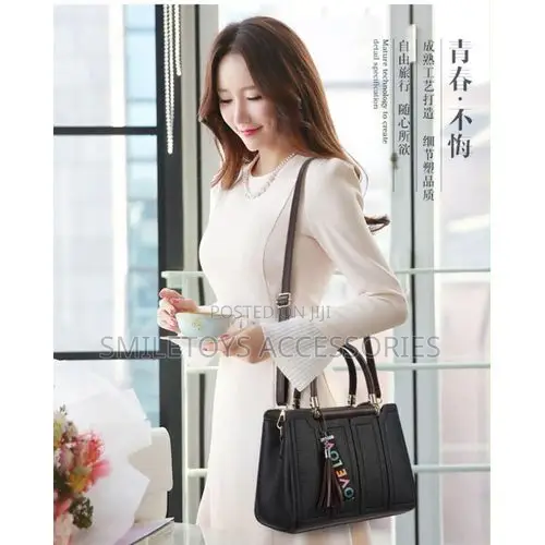 Structured Handbag With Tassel Charm & Strap