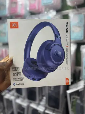 JBL Tune 730BT Wireless Over-Ear Headphones in Blue.