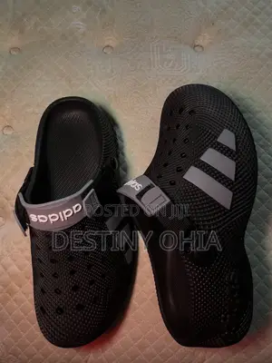 Black Adidas Clogs With Adjustable Strap.