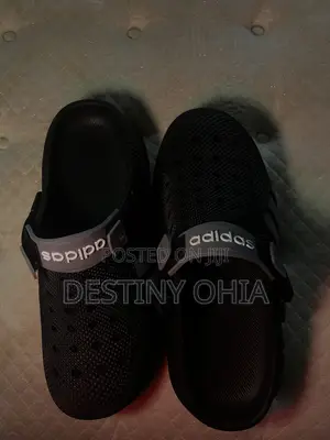 Black Adidas Clogs With Adjustable Strap.