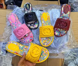 Hermes and Gucci Slippers