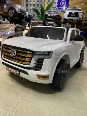 White Toyota Land Cruiser Car for Kids Age 1-5 With Bluetooth & Remote