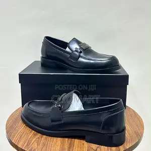 Dolce & Gabbana Plaque Leather Loafers