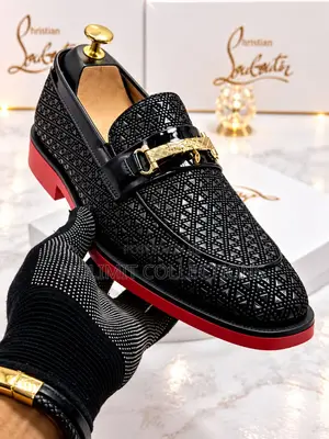 Men's Christian Louboutin Textured Loafers With Red Soles