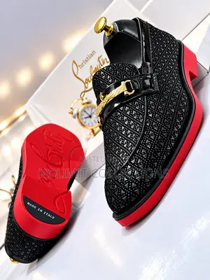 Men's Christian Louboutin Textured Loafers With Red Soles