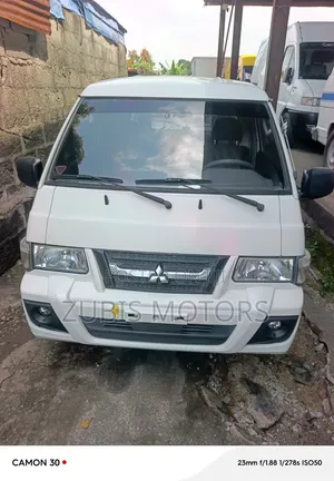 Mitsubishi L300 2014 White