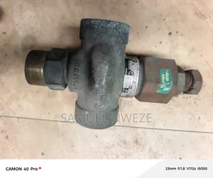 Multi-Port Industrial Metal Valve, Resembling a 3-Way Control Valve 2"