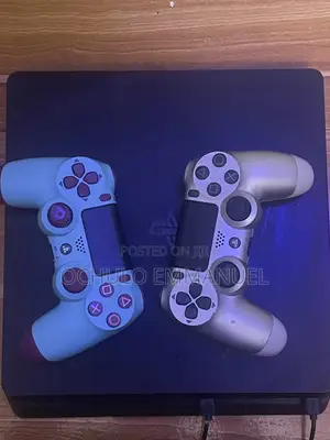 JB UK Fairly Used PS4 Slim With Two Pads, 7 Games Installed and HDMI