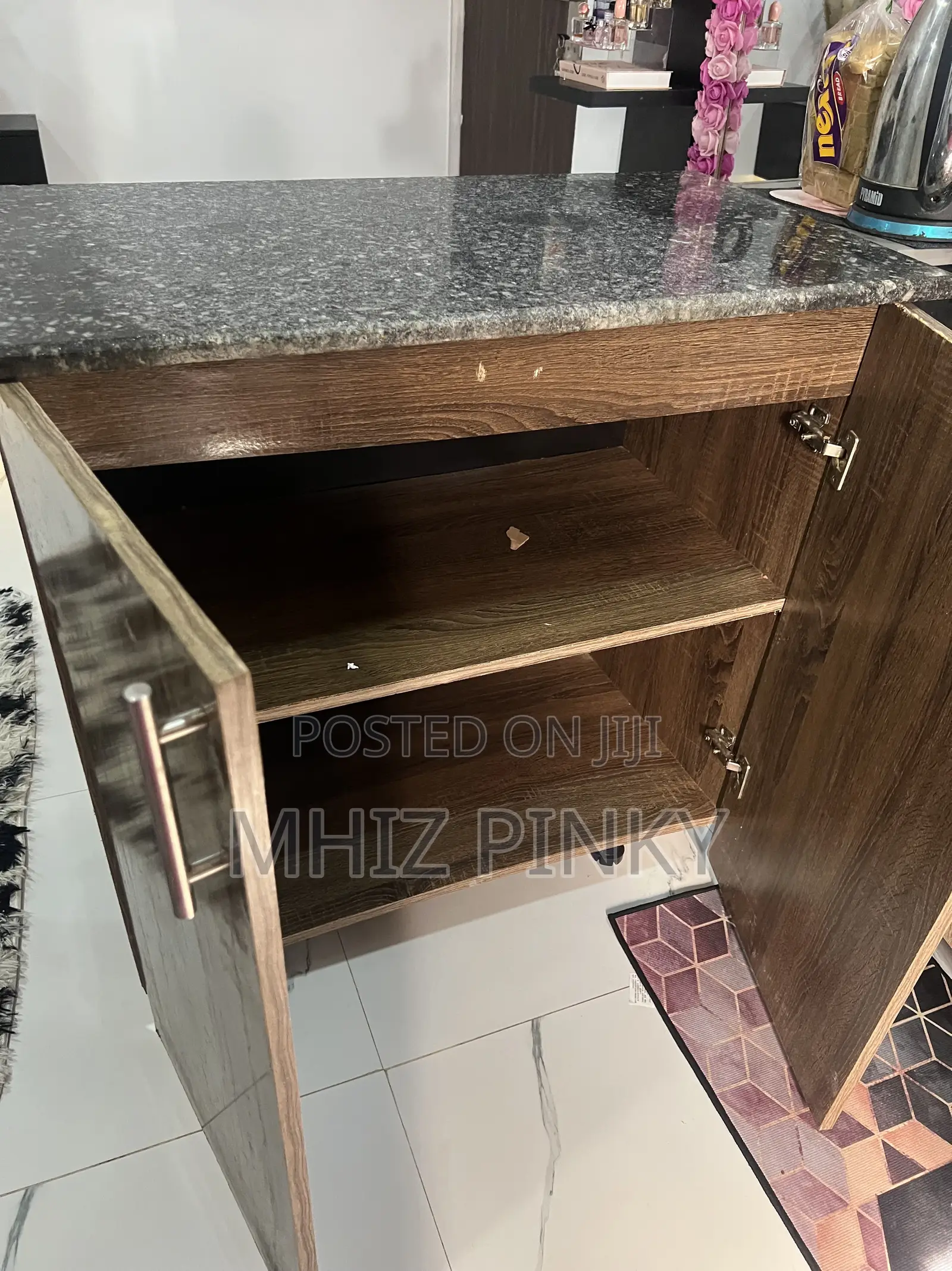 A Mable Top Kitchen Cabinet