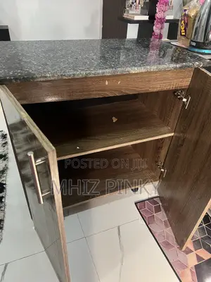 A Mable Top Kitchen Cabinet