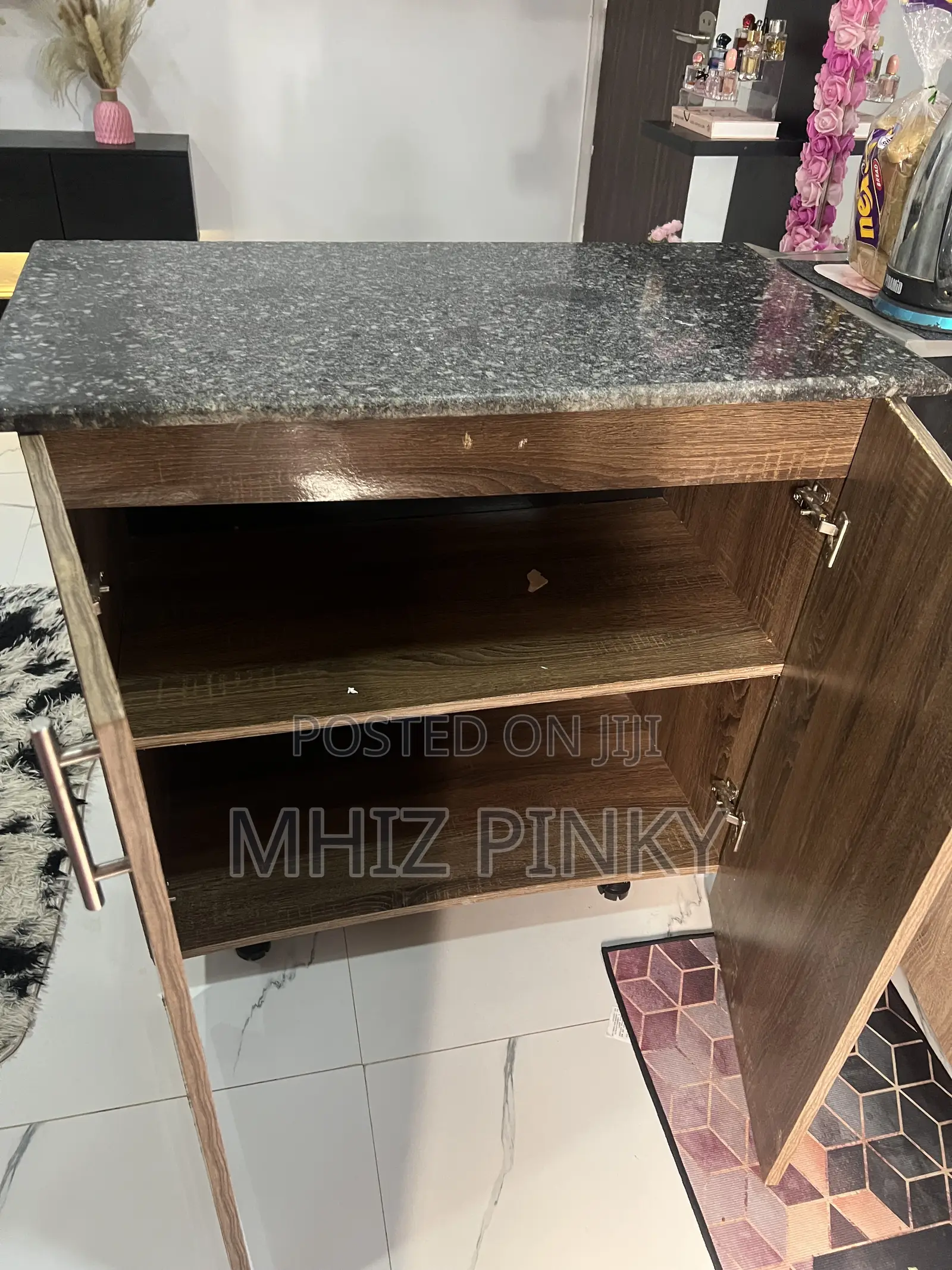 A Mable Top Kitchen Cabinet