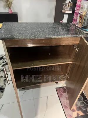 A Mable Top Kitchen Cabinet