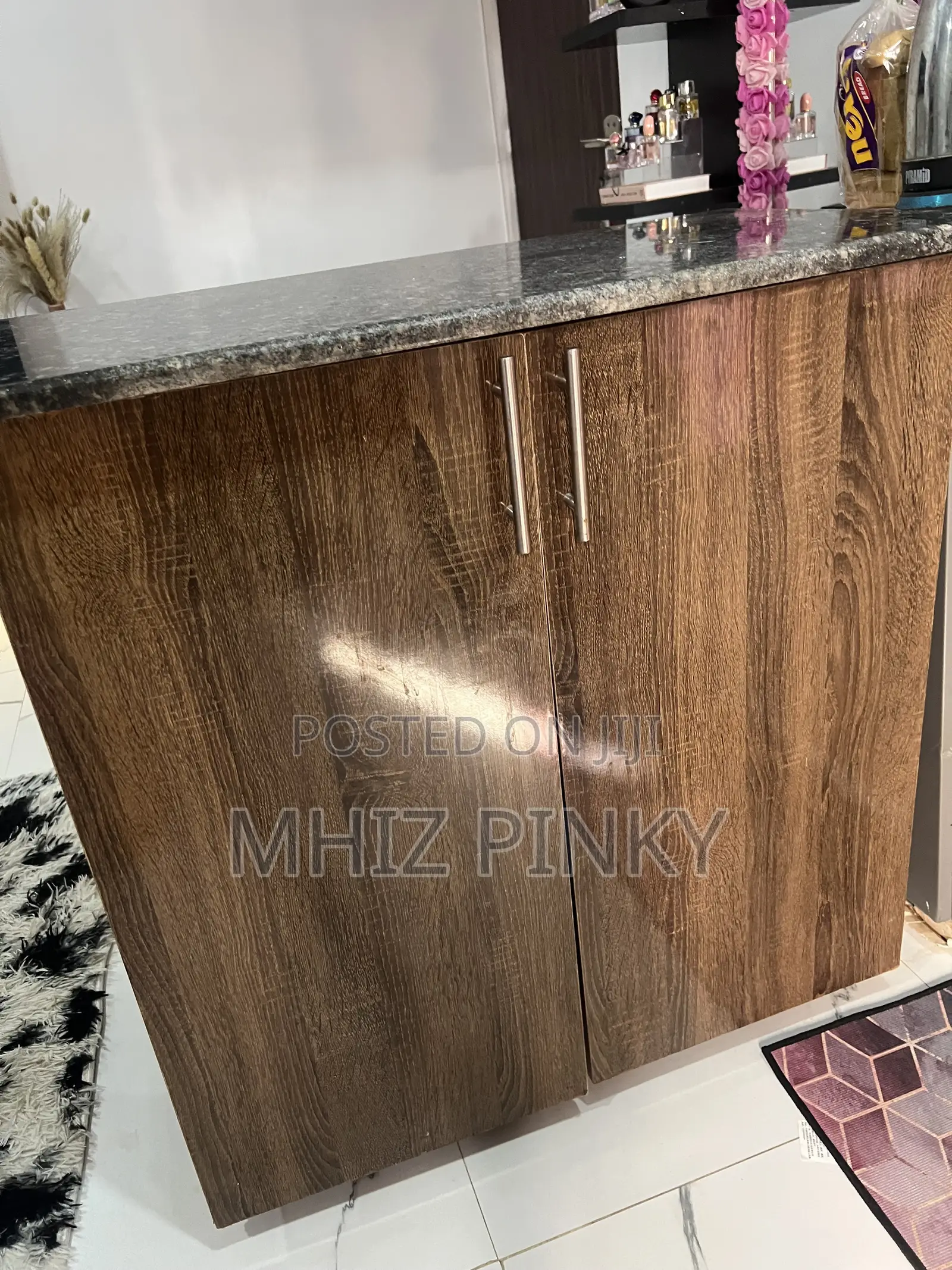 A Mable Top Kitchen Cabinet