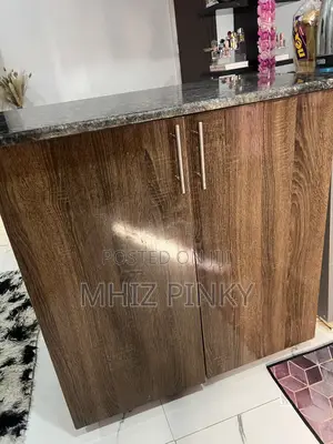 A Mable Top Kitchen Cabinet