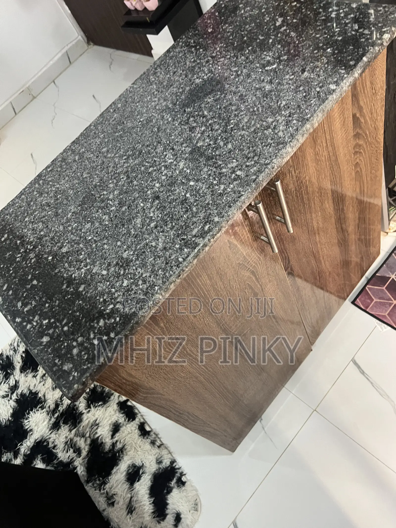 A Mable Top Kitchen Cabinet