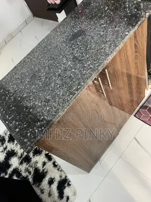 A Mable Top Kitchen Cabinet