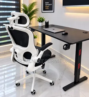 Electric Height-Adjustable Office Desk With Ergonomic Office Chair.