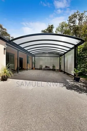 Modern Arched-Roof Carport With a Black Powder-Coated Steel or Metal