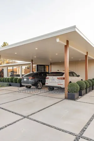 Flat-Roof Carport Supported by Warm Timber