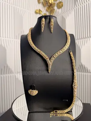 Gold Crystal v-Neck Jewelry Set – Necklace, Earrings, Bracelet & Ring