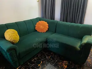 A Neatly Used L Shape Sofa