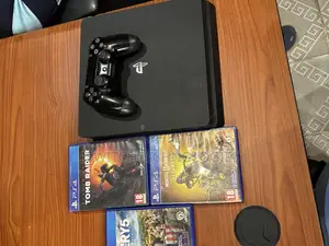Sony PlayStation 4 Slim 500GB Console + 3 Original Game Discs