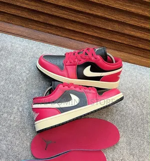 Air Jordan 1 Low Women's in "Mystic Hibiscus / Black / Coconut Milk"