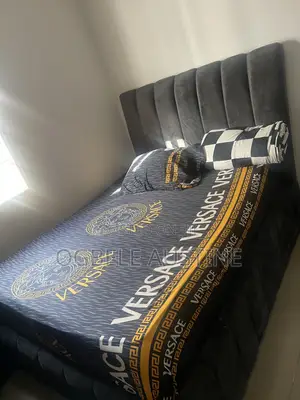 Slightly Used 4.5 by 6 Mattress & Bedframe