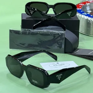 *Original Prada Glasses Available in Store 