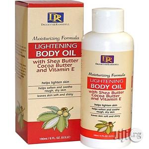 Photo - Daggett & Ramsdell Lightening Body Oil With Shea Butter Cocoa Butter And Vitamin E- 180ml