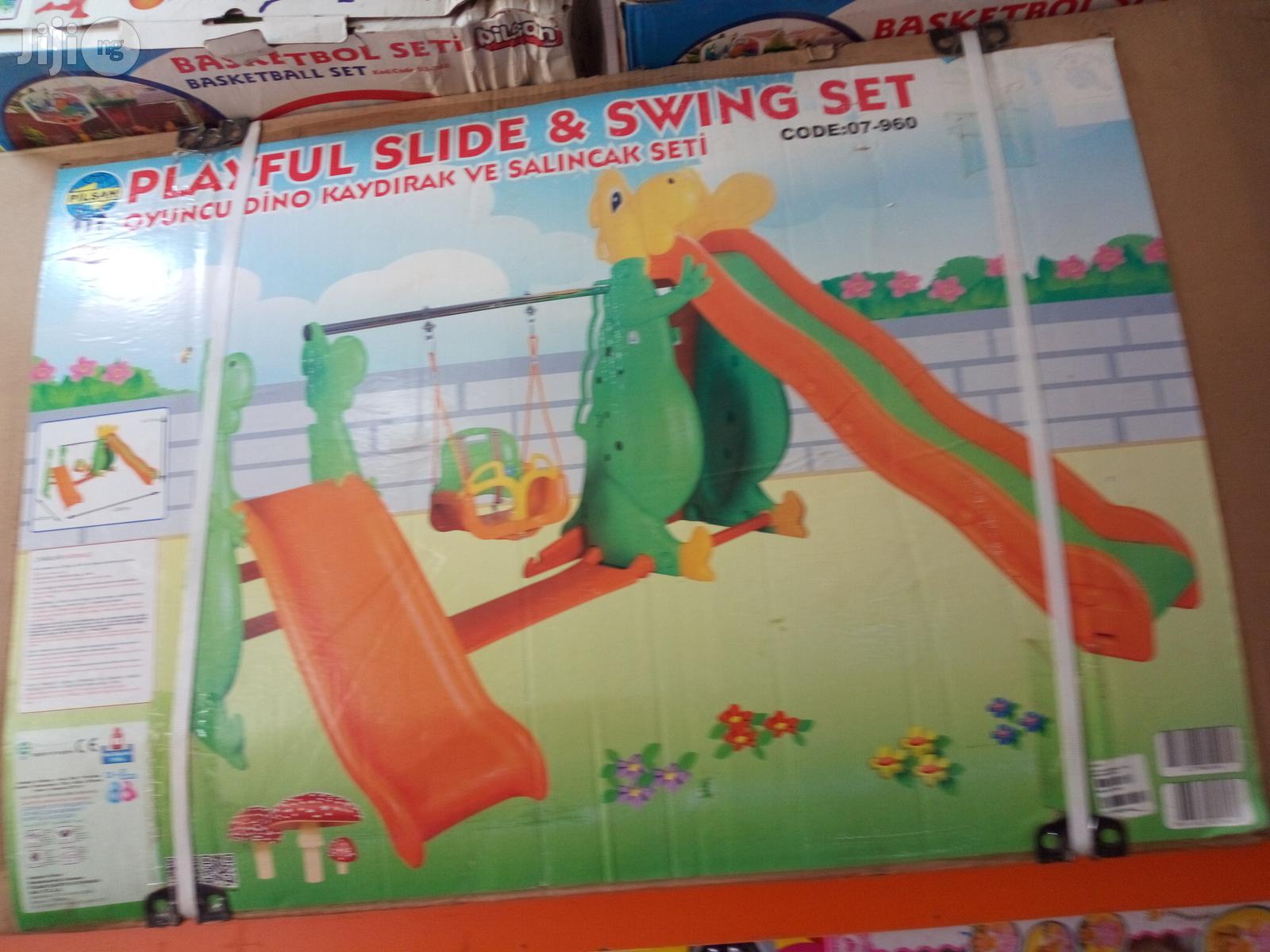 Playful Slide And Swing Set
