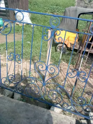 Wrought Iron Window And Hand Rail