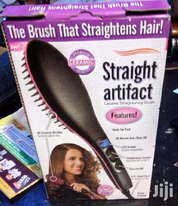 Electric Brush Straightens Hair
