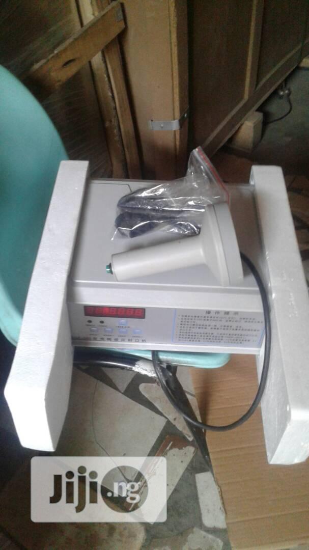 Induction Sealing Machine.