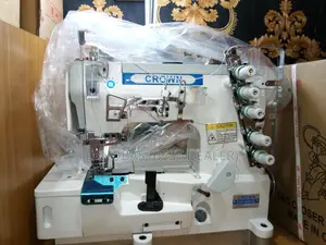 Crown Taping Machine