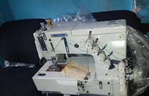 Elasticator Sewing Machine