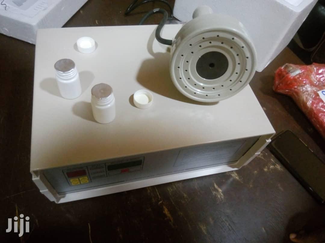 Induction Sealing Machine.