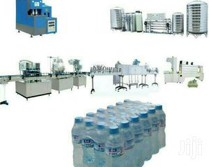 Semi Auto Washing, Filling and Capping With Shrink Label