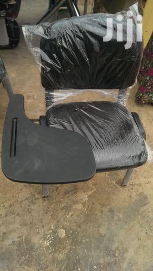 A Unique Visitors Chair With Light Arm