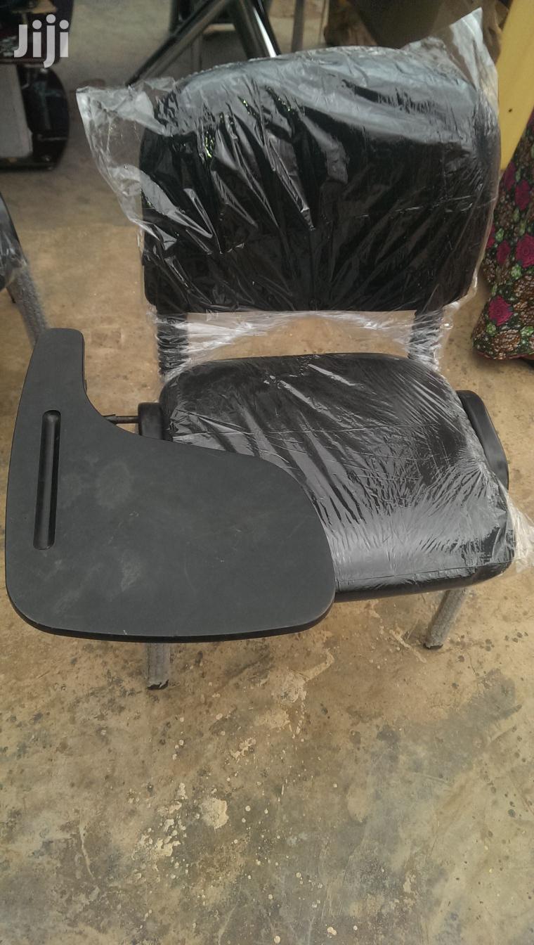 A Unique Visitors Chair With Light Arm