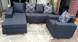 Black Fabric L-Shape Sofa With Single Chair and Pillows