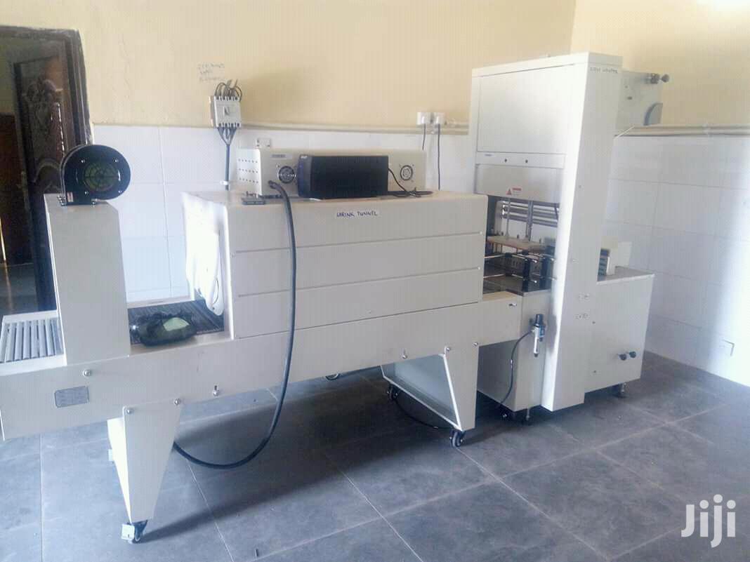 Semi Automatic Shrink Wrapper Packaging Machine.