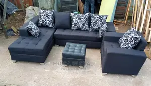 L-Shaped Sofas, a Single Seater Chair, Ottoman. Fabric Couch